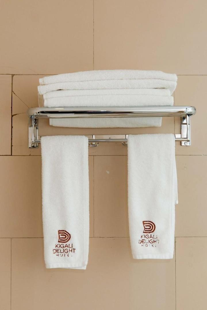 Junior Suite bathroom with freestanding bathtub and rain shower